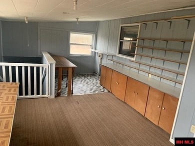 Great buy on a 2,000 sq ft home (3 bdrm/2 bath) fronting scenic