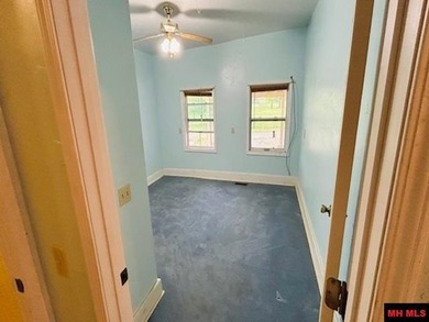 Great buy on a 2,000 sq ft home (3 bdrm/2 bath) fronting scenic