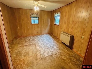 Great buy on a 2,000 sq ft home (3 bdrm/2 bath) fronting scenic