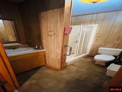 Great buy on a 2,000 sq ft home (3 bdrm/2 bath) fronting scenic