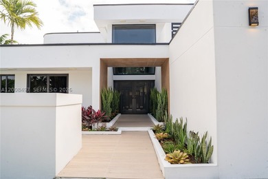 Exquisite modern estate located in the prestigious Village of - photo 3