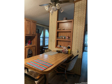 Peaceful country living with two homes on this 8.5 acres. Main