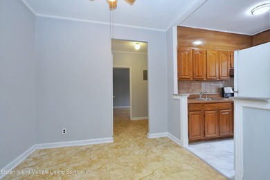 LOCATED IN THE HEART OF MIDWOOD, ON A BEAUTIFUL TREE-LINED