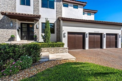 A spectacular custom waterfront estate with a clean California - photo 12