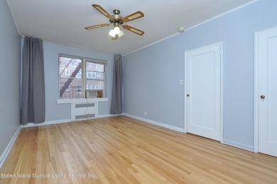 LOCATED IN THE HEART OF MIDWOOD, ON A BEAUTIFUL TREE-LINED