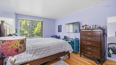 Welcome to this spacious 3-bedroom, 2-bathroom condo located on - photo 3