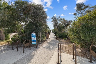 Just steps from the sugar-white sands and emerald waters that - photo 37