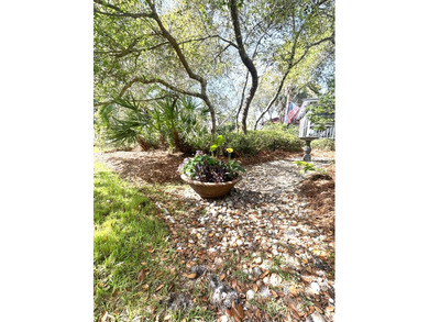 Just steps from the sugar-white sands and emerald waters that - photo 44