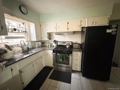 Spacious two family detached home located in the heart of - photo 7