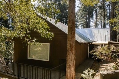 Located in the scenic mountain community of Alta Sierra, this - photo 1