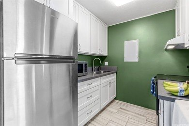 High-floor 1-bedroom, 1-bath residence at Kinau Lanais featuring - photo 6