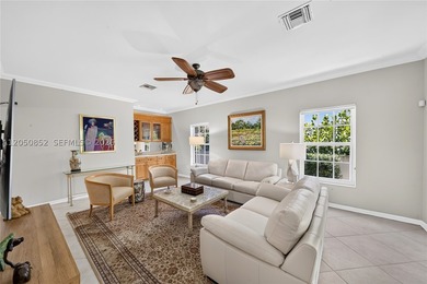 Perfectly situated on a quiet, tree-lined street in one of Coral - photo 11