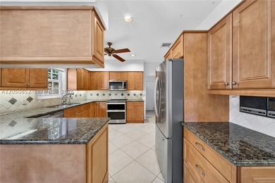 Perfectly situated on a quiet, tree-lined street in one of Coral - photo 15