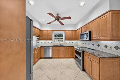 Perfectly situated on a quiet, tree-lined street in one of Coral - photo 16