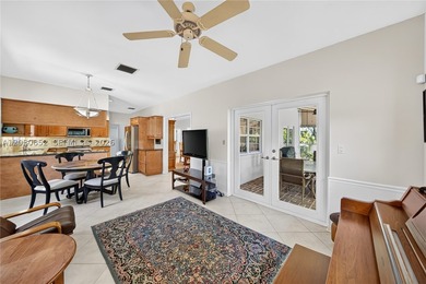 Perfectly situated on a quiet, tree-lined street in one of Coral - photo 19