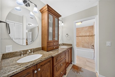 Perfectly situated on a quiet, tree-lined street in one of Coral - photo 27