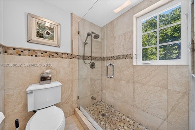 Perfectly situated on a quiet, tree-lined street in one of Coral - photo 29