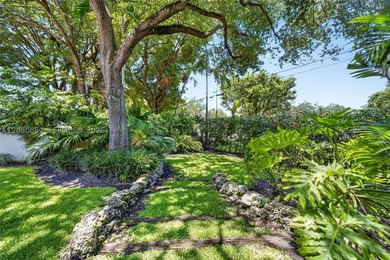 Perfectly situated on a quiet, tree-lined street in one of Coral - photo 36