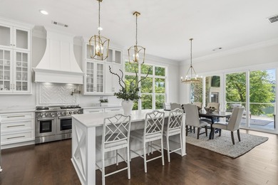 Welcome to 112 S. Cay Drive, a refined lakefront retreat on - photo 13