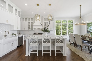 Welcome to 112 S. Cay Drive, a refined lakefront retreat on - photo 14