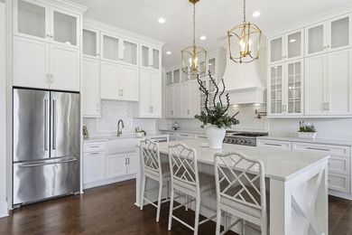 Welcome to 112 S. Cay Drive, a refined lakefront retreat on - photo 15