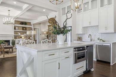 Welcome to 112 S. Cay Drive, a refined lakefront retreat on - photo 17