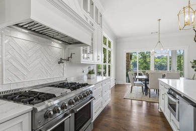 Welcome to 112 S. Cay Drive, a refined lakefront retreat on - photo 21