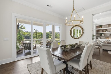 Welcome to 112 S. Cay Drive, a refined lakefront retreat on - photo 22