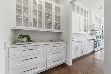 Welcome to 112 S. Cay Drive, a refined lakefront retreat on - photo 25