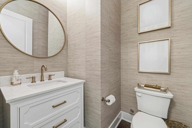 Welcome to 112 S. Cay Drive, a refined lakefront retreat on - photo 26