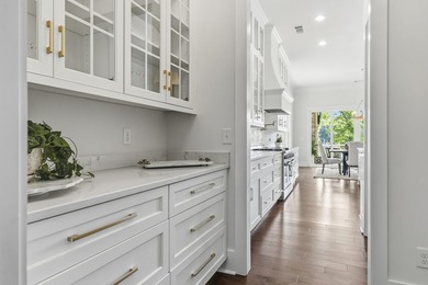 Welcome to 112 S. Cay Drive, a refined lakefront retreat on - photo 27