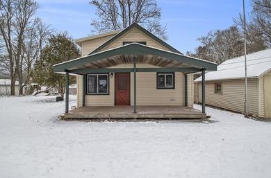 Lake Home For Sale in Onekama, Michigan