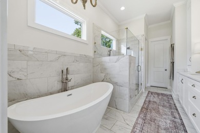 Welcome to 112 S. Cay Drive, a refined lakefront retreat on - photo 36