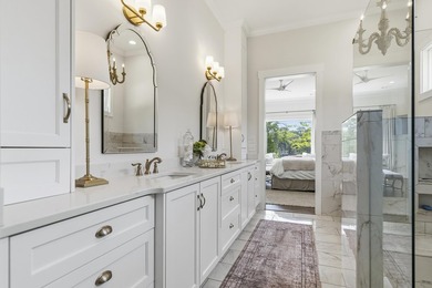 Welcome to 112 S. Cay Drive, a refined lakefront retreat on - photo 37