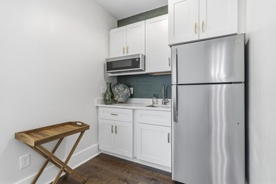 Welcome to 112 S. Cay Drive, a refined lakefront retreat on - photo 48