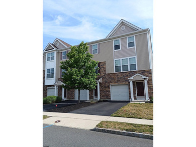 Beautifully maintained 3-bedroom, 2.5-bath townhome in the - photo 1