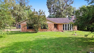 Great corner-lot home in the Hideaway Lake community! This - photo 1