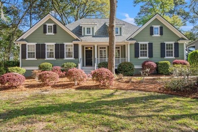 Beautiful residence set on a wooded homesite with mature oak and - photo 1