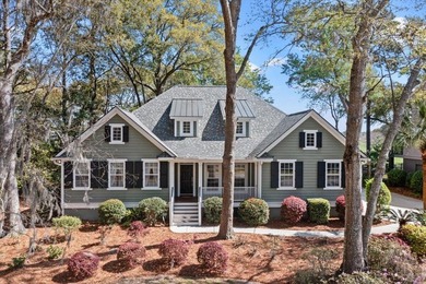 Beautiful residence set on a wooded homesite with mature oak and - photo 2