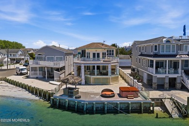 Experience elevated bayfront living in this exceptional - photo 1