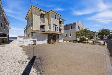 Experience elevated bayfront living in this exceptional - photo 3