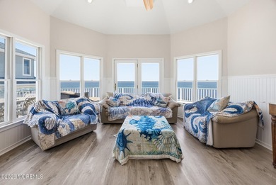 Experience elevated bayfront living in this exceptional - photo 8