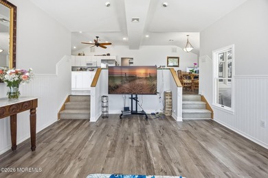 Experience elevated bayfront living in this exceptional - photo 9