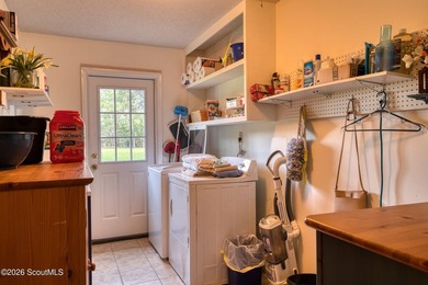 Tucked away where water meets wilderness, this 3-bedroom - photo 12