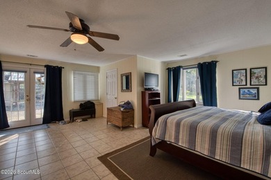 Tucked away where water meets wilderness, this 3-bedroom - photo 13