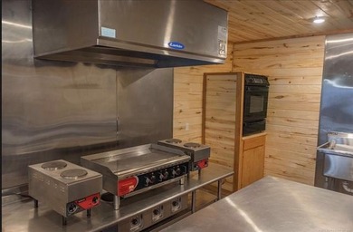 Sitting on 10.99 acres this Home away from Home Lodge has an - photo 15