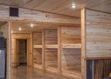 Sitting on 10.99 acres this Home away from Home Lodge has an - photo 16