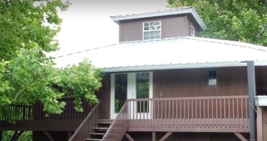 Sitting on 10.99 acres this Home away from Home Lodge has an - photo 17