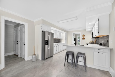 This beautiful brick home is perfectly situated on the scenic - photo 19