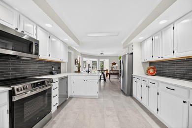 This beautiful brick home is perfectly situated on the scenic - photo 20
